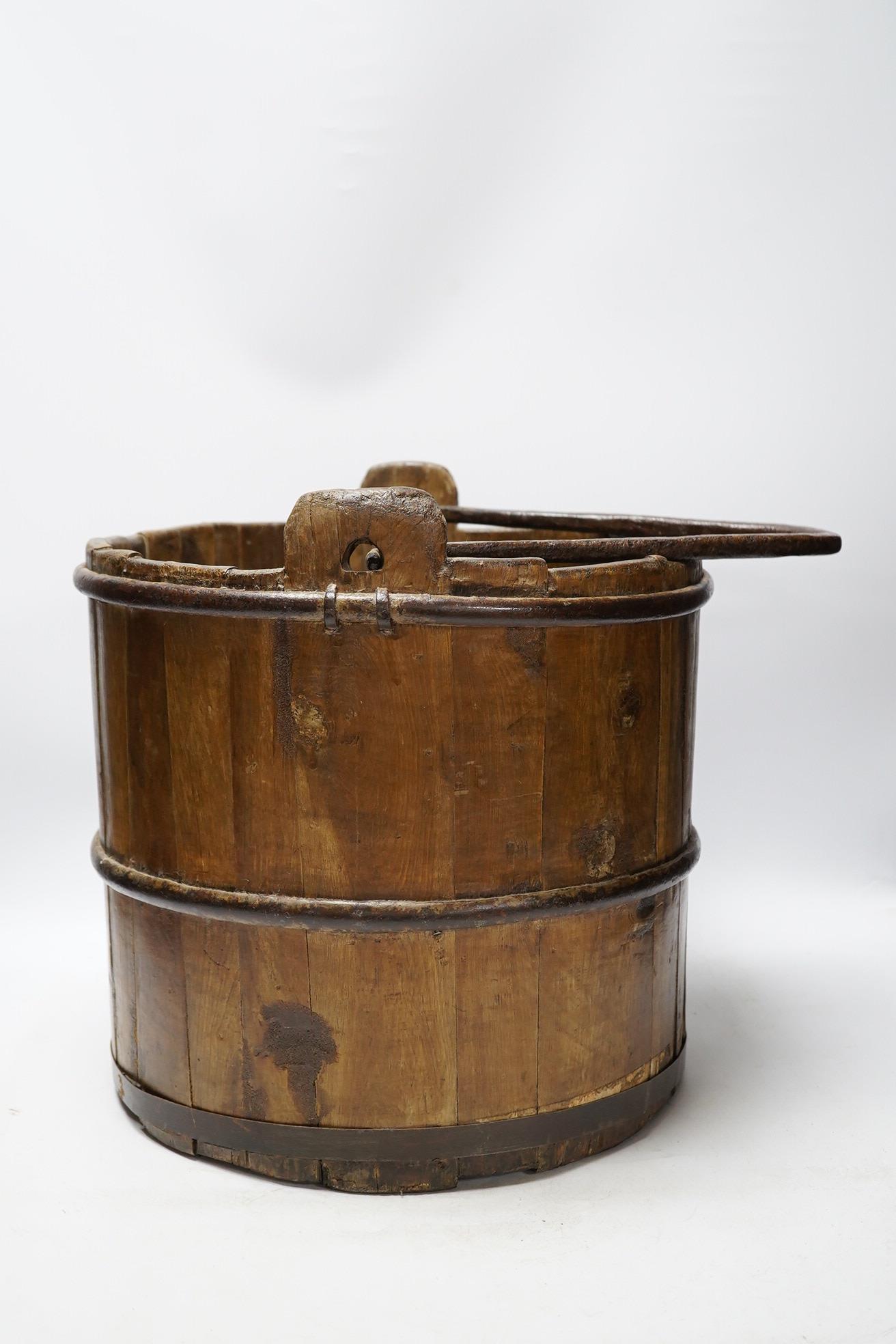 A 19th century coopered well bucket, 34cm. Condition - fair